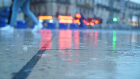 Montpellier-place-de-la-comedie-rainy-day-raindrops-on-pavement-France